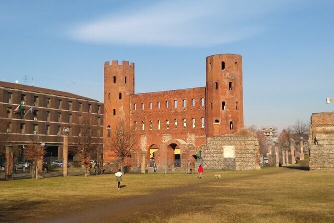 Highlights of Turin Private Walking Tour - Via Po arcades: bookshops, cafés, and artisan storefronts